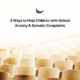 3 ways to help children with school anxiety blog cover image school auditorium lecture hall